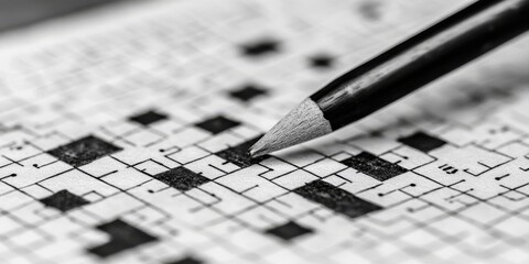 Black and white crossword puzzle awaiting resolution, featuring a challenging layout that invites enthusiasts to engage with the crossword puzzle and test their vocabulary skills.