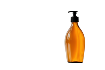 Beautiful amber bottle with pump in soft natural light on a minimalist background showcasing product design