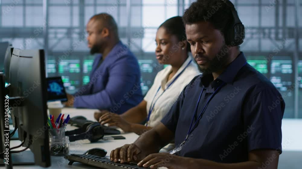Poster data center admin typing on keyboard, maintaining company network infrastructure by configuring hard