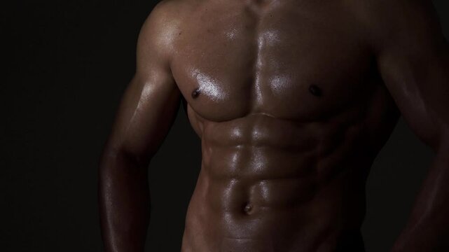 Male chest. Perfect abs, shoulders, and chest. Close up the Abs. Closeup torso. Ab. Muscular chest and ripped abs. Sexy male muscular body. Man with naked torso showing chest and six pack abs.