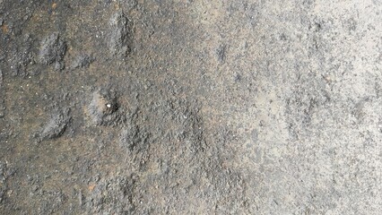Grungy cement texture background. Spots of white paint on a gray concrete background, texture, photo. old cement