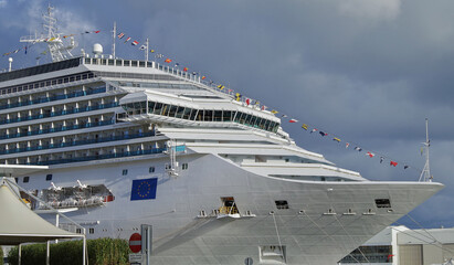 Modern Italian cruiseship cruise ship liner Fascinosa during sunset in port of Savona, Italy during...