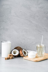 a showcase of coconut products. natural sugar, milk, chips, water.