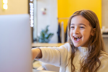 Surprised girl with laptop. Girl and laptop. Technology concept.