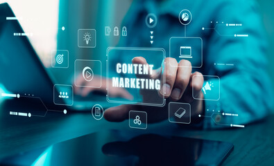 businessman is using a laptop to create marketing content.Creating marketing strategies involves sharing information to attract customer interest.Online marketing and digital marketing.