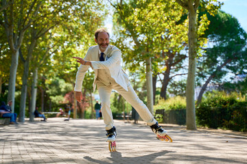Man roller skating with a cheerful expression in a park