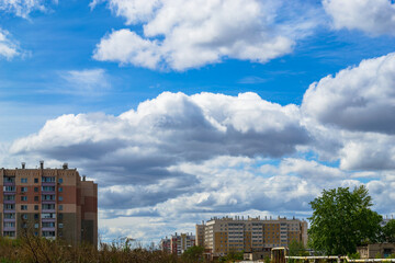 Beautiful sky and clouds over residential buildings