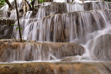Travel to waterfalls during the rainy season, The tiers of the waterfall contrast beautifully with the sky, Nature itself is the best physician