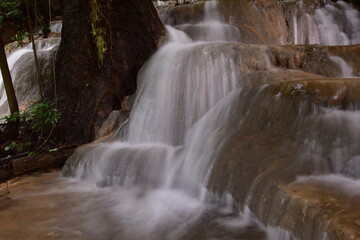 Travel to waterfalls during the rainy season, The tiers of the waterfall contrast beautifully with the sky, Nature itself is the best physician