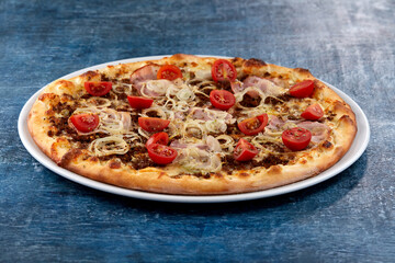 fresh pizza on the white plate