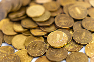 Ten russian rubles coins on background
