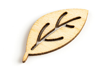 Close up macro shot of laser cut wooden leaf, isolated on white background.