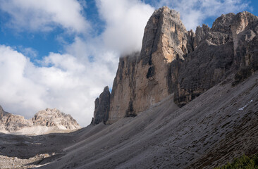 rocky hiking trail below tre cime mountains in the Italian Dolomites
