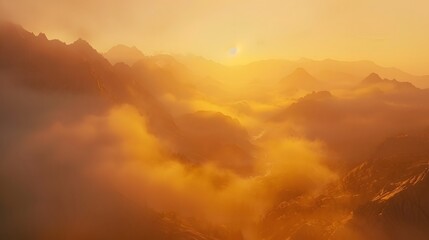 Fototapeta premium Golden Sunset Over Misty Mountain Ranges