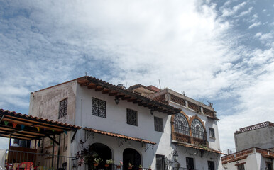 Beautiful colonial architecture against a blue sky in Taxco de Alarcon Mexico