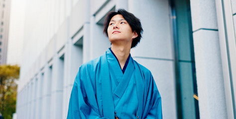 Japanese man, thinking and urban city with traditional fashion, outfit and yukata for heritage....