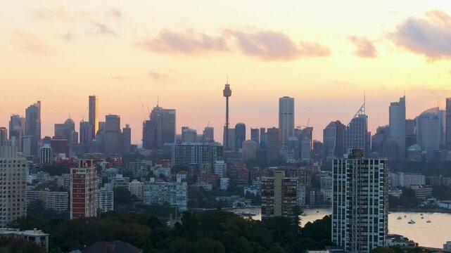 Aerial view of beautiful cityscape with modern skyscrapers at sunset, Sydney, Australia.