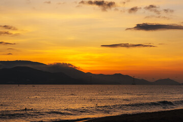 Sunrise. Clouds over the sea in the morning with orange, yellow sunlight