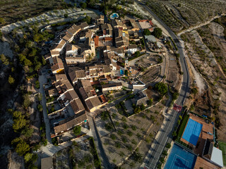 Benillup village aerial skyline at sunset,  Drone point of view, Alicante, Costa Blanca, Spain