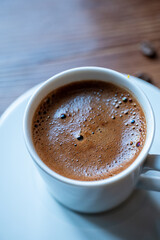 cup of turkish coffee on wooden table