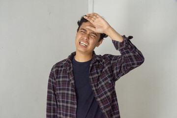 Man in Plaid Shirt feel sweat
