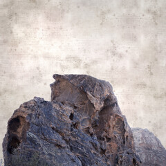 textured stylish old paper background, square, with landscape of Gran Canaria, around the Dog of Bentayga rock formation 