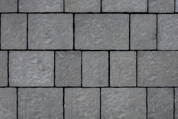Dark gray exterior paving stones closeup texture