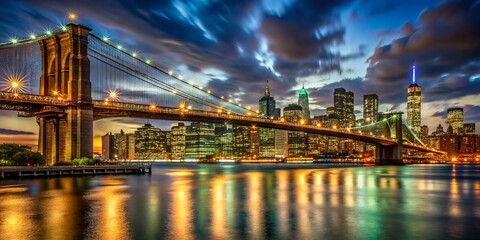 Obraz premium Captivating Night Photography of the Brooklyn Bridge Illuminated with City Lights at Dusk, Showcasing Urban Beauty and Iconic Architecture in a Vibrant City Limit Scene