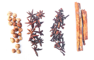 Group of cardamom, cinnamon, star anise, anise seed, clove, coriander seeds, isolated on white background. Collect natural spices