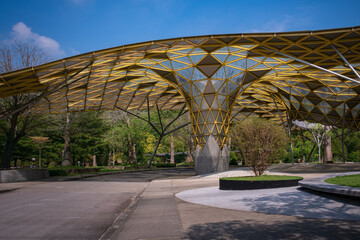 Infrastructure of the Kuala Lumpur Perdana Botanical Garden featuring walking paths, benches,...