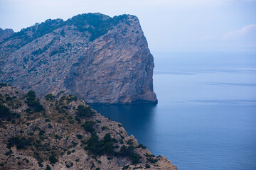 High cliffs jutting out far into the sea. Beautiful seascape.