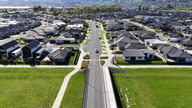 Aerial view of suburban neighborhood with beautiful homes and green spaces, Richmond, New Zealand.