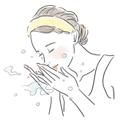 水で洗顔している女性の上半身