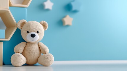 A cute, knitted teddy bear sits on a bright, minimalist background with stars, perfect for children's product advertisements, nursery decor, or social media posts related to parenting,