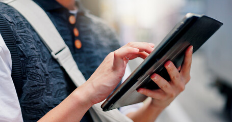 Research, travel and hands with tablet, city and browsing for trends, online or commuting on street. Typing, digital and app for media strategist, website and planning for campaign or person in Japan