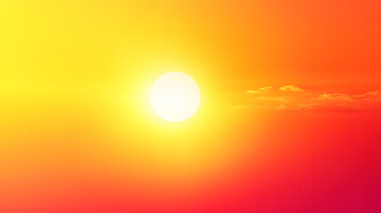 Vibrant sunset or sunrise scene with a bright sun dominating the yellow and orange sky.  Few wispy clouds are visible near the sun. Ideal for warm, summery backgrounds.