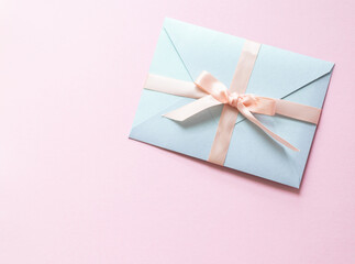 light blue сertificate with pink bow, gift certificate, gift voucher or discount
