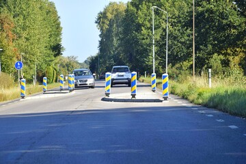 Speed ​​limiters on a country road due to forced slow traffic through the village. Sweden.