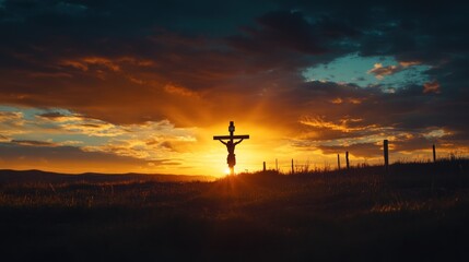 A silhouette of Jesus on the cross against a dramatic sunset, clouds parting in the sky