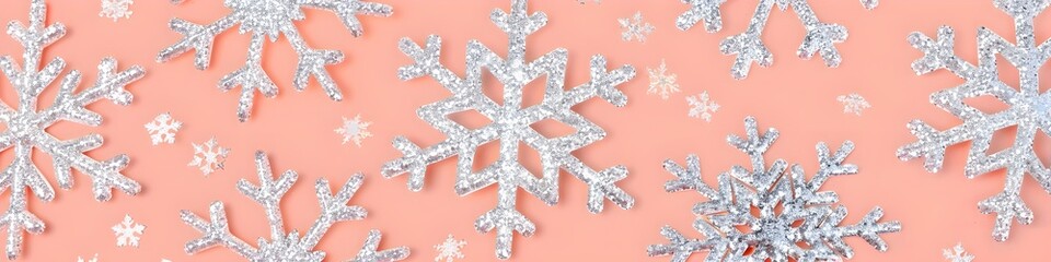Snowflakes pattern on orange background. Christmas and New Year holiday concept. Peach fuzz. Paper cut style. Winter design for greeting card, banner, wrapping paper, textile, print
