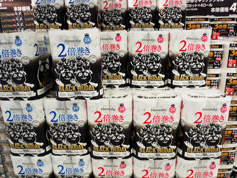 CHIBA, JAPAN - November 1, 2024: Piles of kitchen towels which are part of a Black Friday sale in a shopping center in Chiba City⁬. 