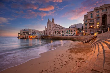 Fototapete Mediterranes Europa St. Julian's, Malta. Cityscape image of seaside town St. Julian's, Malta at beautiful sunrise.  © rudi1976