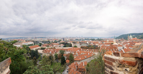 Prague (Praha) cityscape panorama from an observation point near the castle. View above the capital city in Czechia.