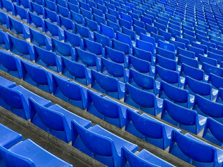 stadium stands with closed blue seats