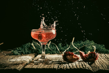 red cocktail splashing festive fizzy drink