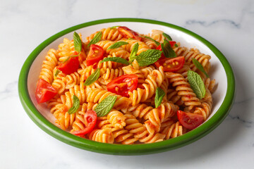 Fusilli pasta, spiral or spirali pasta with tomato sauce - Italian food style