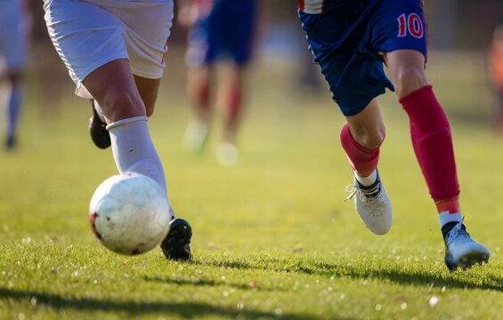 two women playing soccer