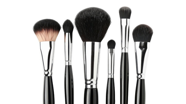A set of six professional makeup brushes arranged elegantly on a clean white surface ready for beauty application or artistry work.