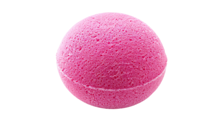 Bright pink bath bomb resting on a white surface, showcasing its texture and spherical shape for relaxation during bath time.