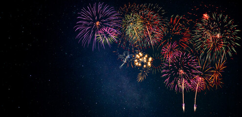 Fireworks with blur milky way background